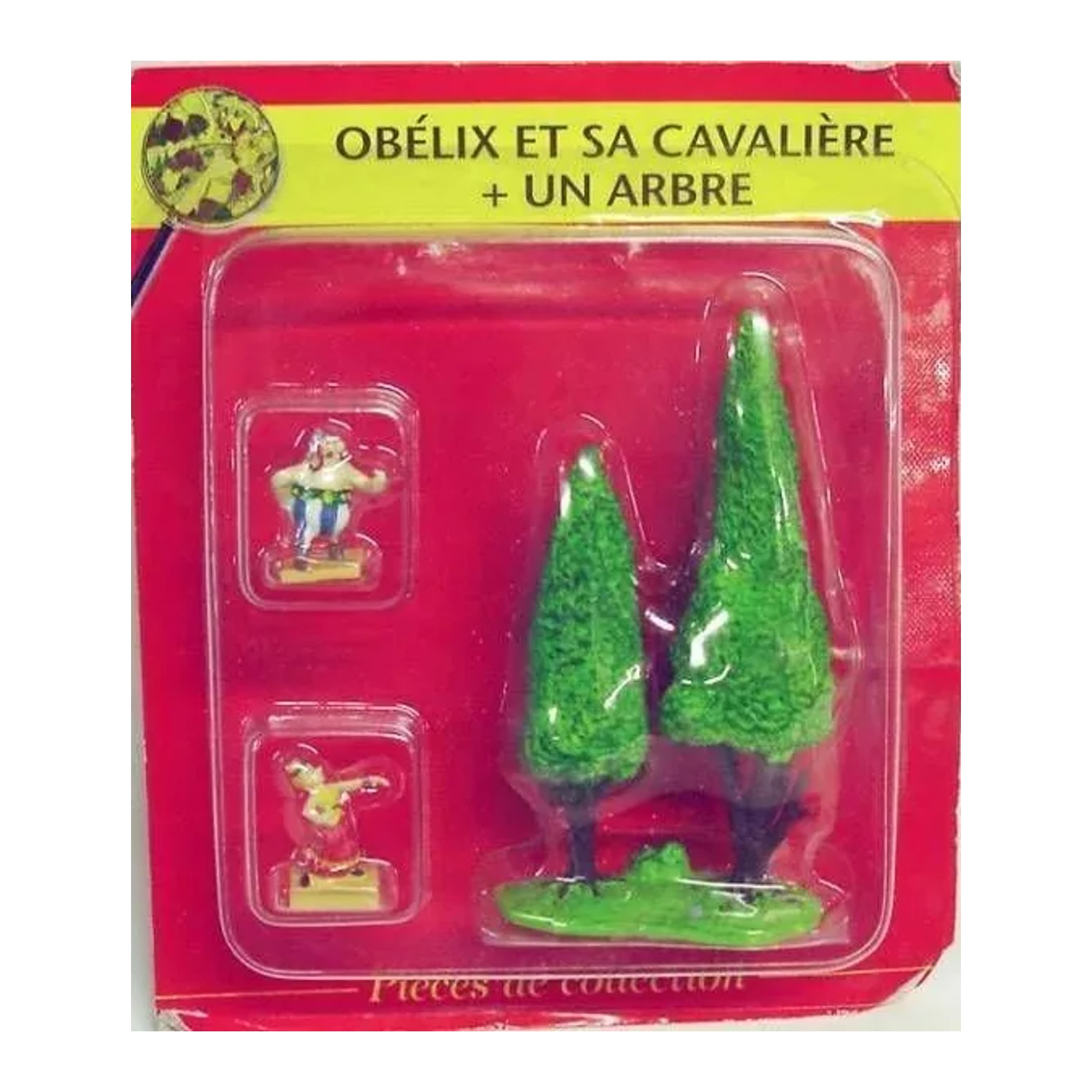 N° 15 – Obélix au bal, sa cavalière et deux arbres en fuseau – blister Village Astérix Atlas